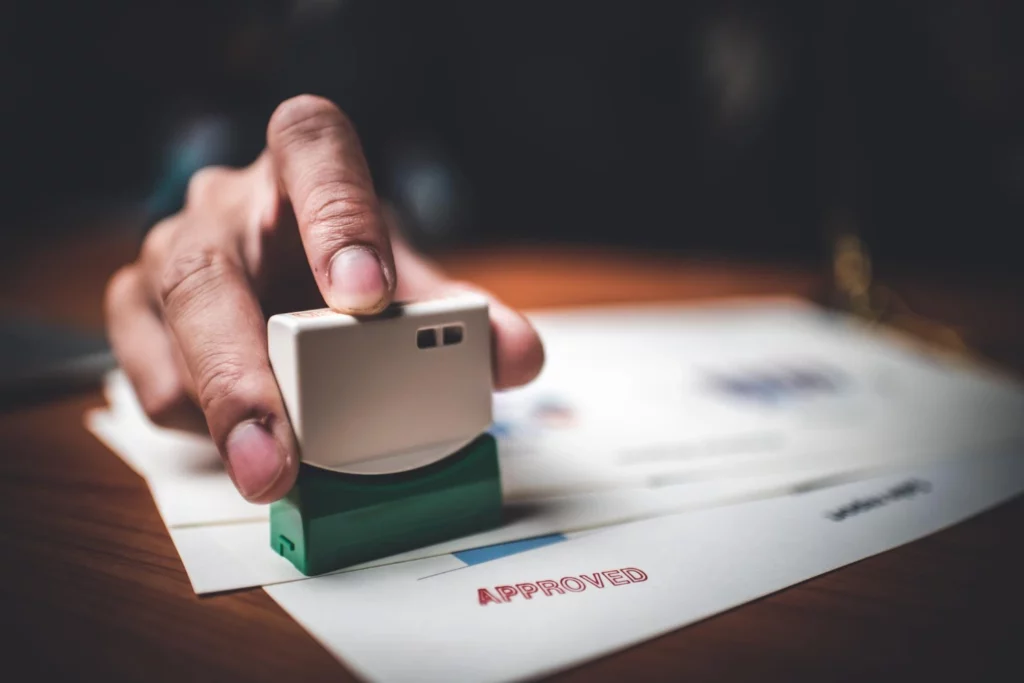 Approved stamp on document — Malaysia Employment Pass salary Approved stamp on document — Malaysia Employment Pass salary